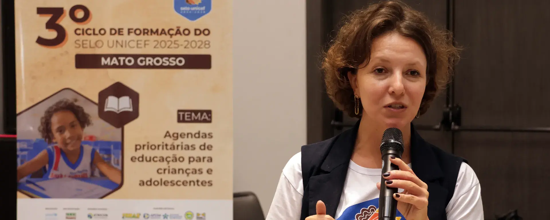 Foto do público presente durante o evento. 