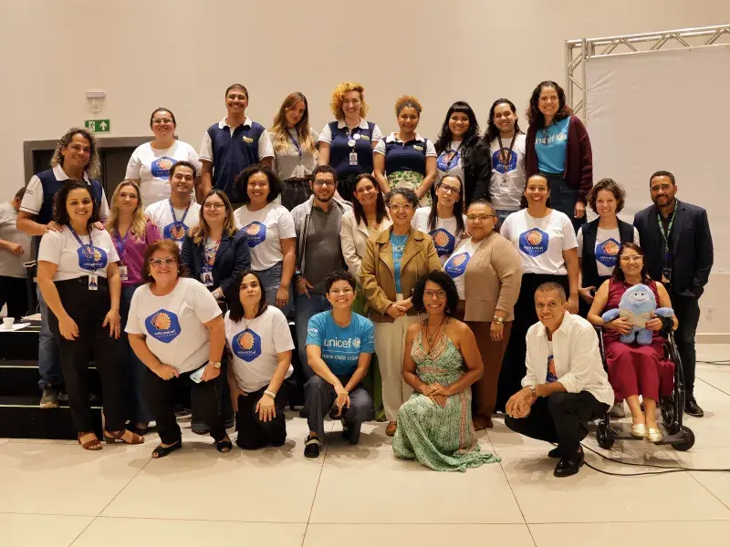 Foto do público presente durante o evento. 