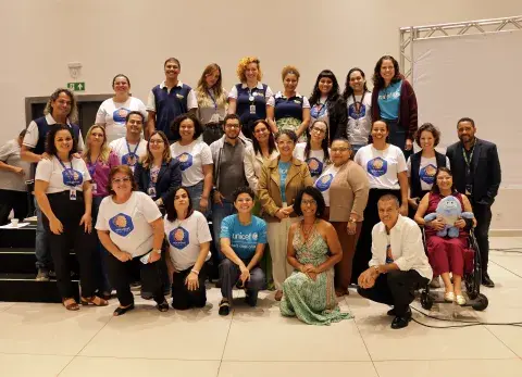 Foto do público presente durante o evento. 