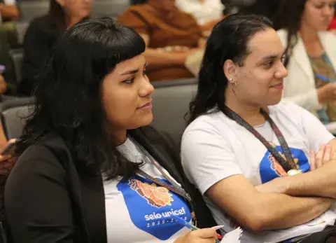 Foto das equipes no auditório
