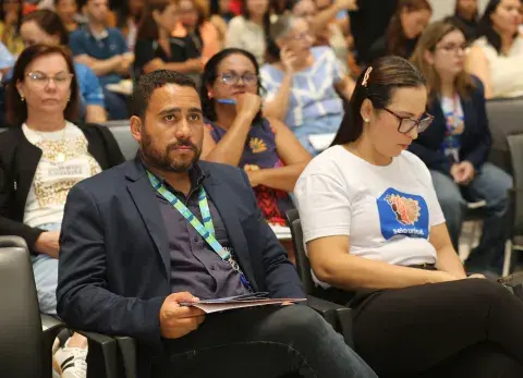 Foto das equipes no auditório