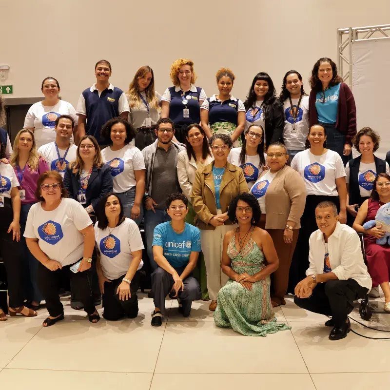 Foto do público presente durante o evento. 